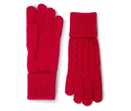 Ein Paar rote Strickhandschuhe liegen nebeneinander.