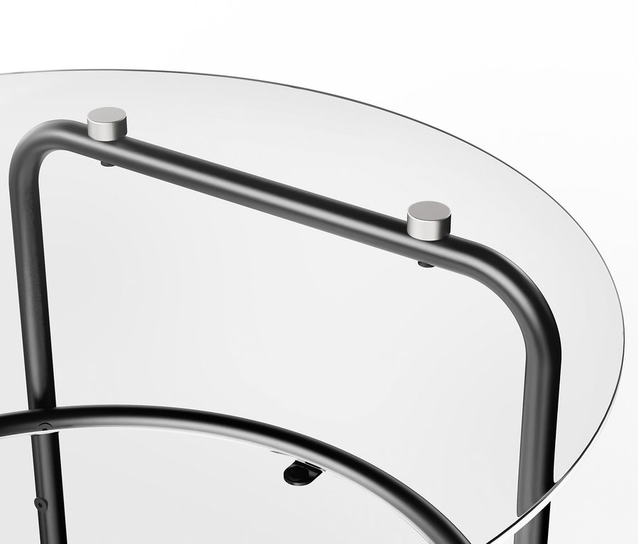 Detailansicht eines Couchtischs mit Glasplatte.