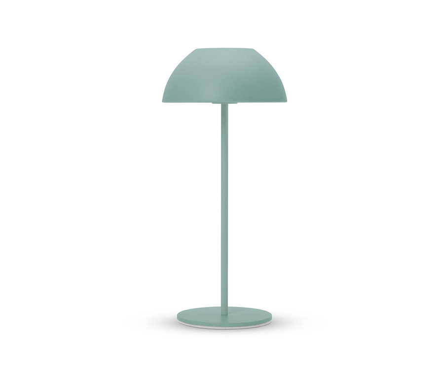 Eine türkisfarbene Lampe mit halbkugelförmigem Schirm steht vor einem weißen Hintergrund.