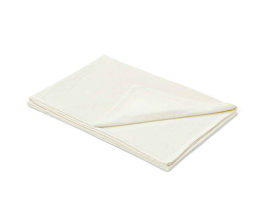 Gefaltete Tagesdecke.