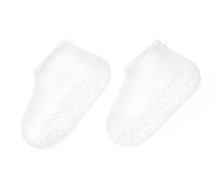 Zwei Regen-Überziehschuhe liegen nebeneinander.