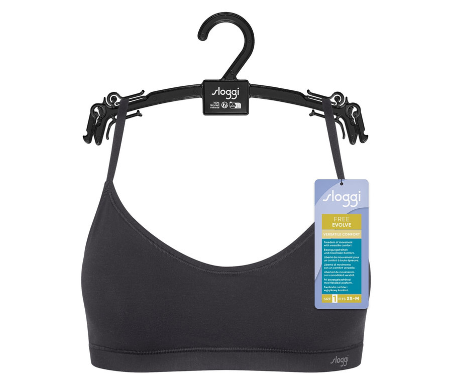 Schwarzer Sloggi BH hängt an einem schwarzen Kleiderbügel.