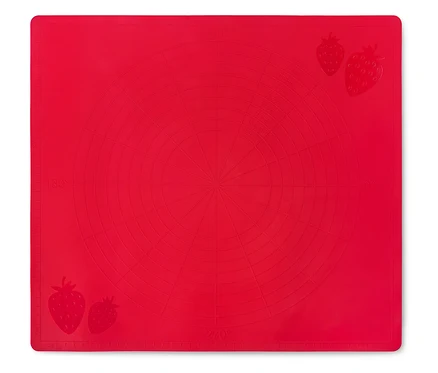 Rote Silikon-Backmatte mit eingeprägten Kreisen und Erdbeeren an den Ecken.