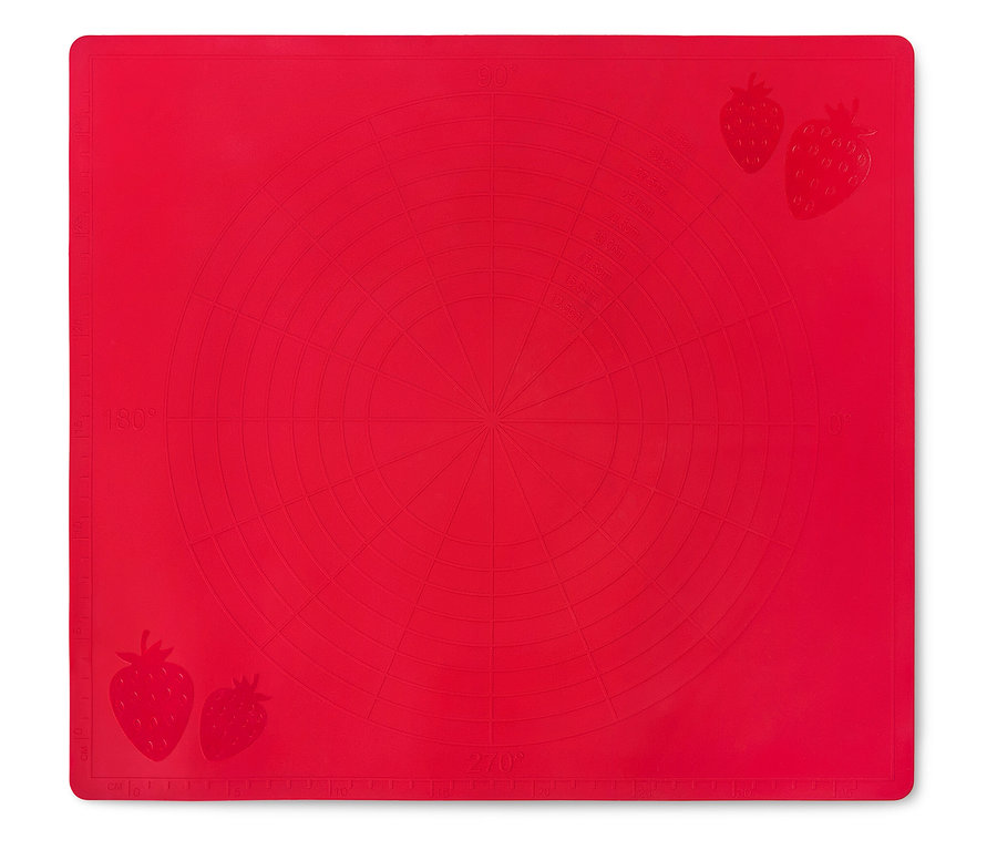 Rote Silikon-Backmatte mit eingeprägten Kreisen und Erdbeeren an den Ecken.