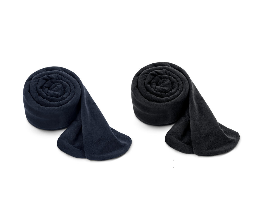 Zwei zusammengerollte 2 Paar Feinstrumpfhosen in Dunkelblau und Schwarz.