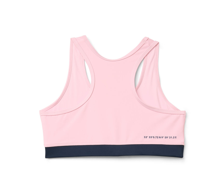 Detailansicht eines rosa Kinder-Bikini-Sets mit dunkelblauem Saum, von hinten gezeigt.