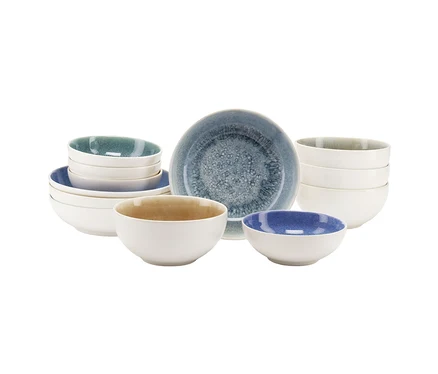 creaTable Bowl-Set »Caldera«, 12-teilig, mit weißen Schalen, innen gesprenkelt in Blau, Türkis, Beige und Dunkelblau, auf weißem Hintergrund.