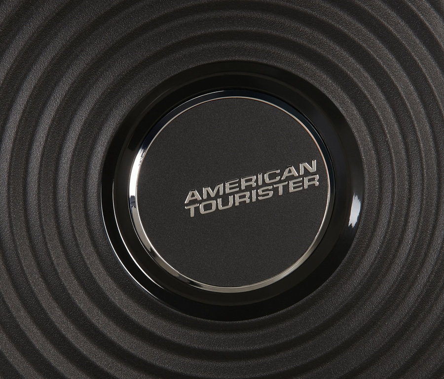 Detailaufnahme eines schwarzen American Tourister Hartschalen-Koffers »Soundbox« Spinner.