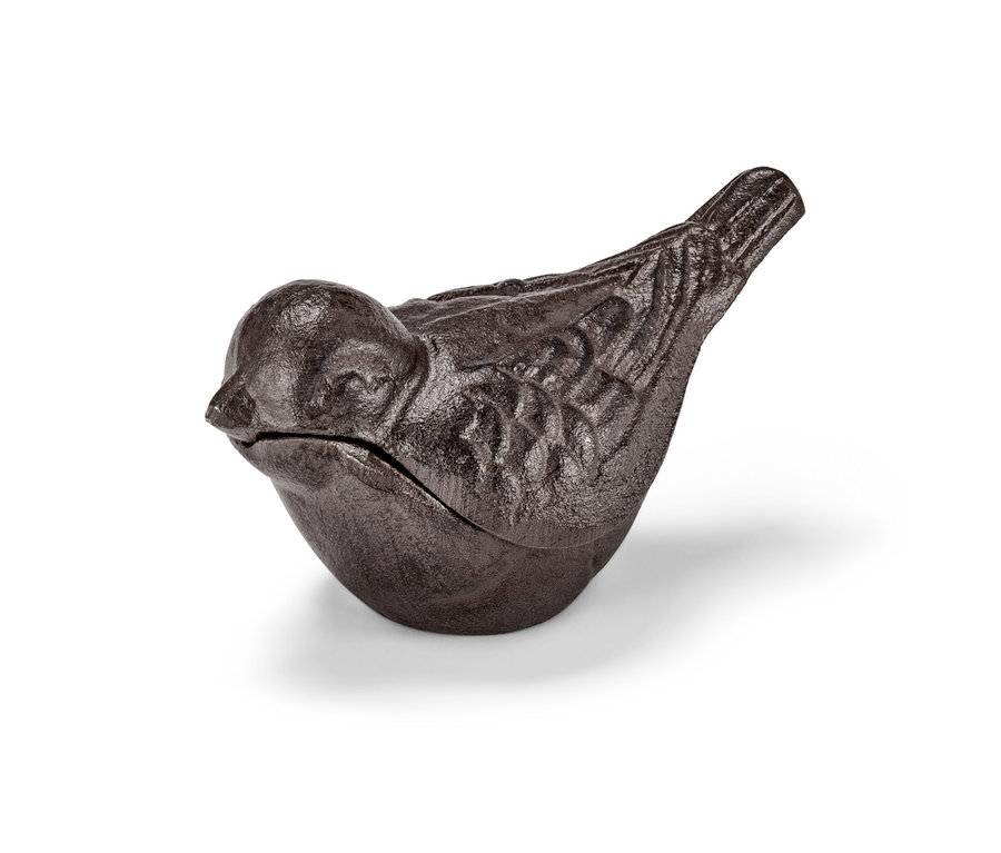 Ein braunes Schlüsselversteck in Vogelform.