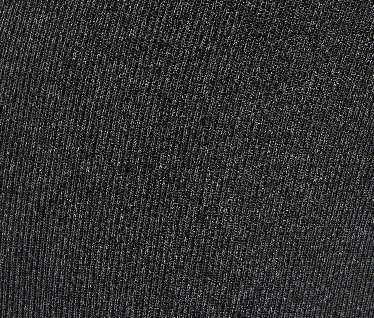 Detailaufnahme eines grauen Strickstoffs.