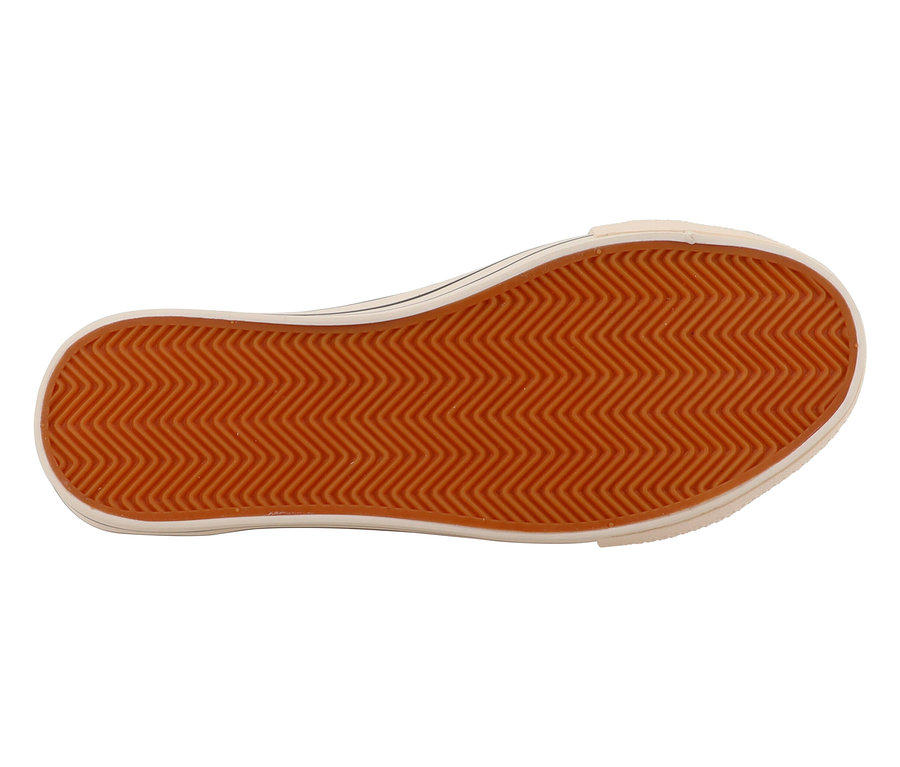 Sohle eines Schuhs mit orangem Zickzackmuster.