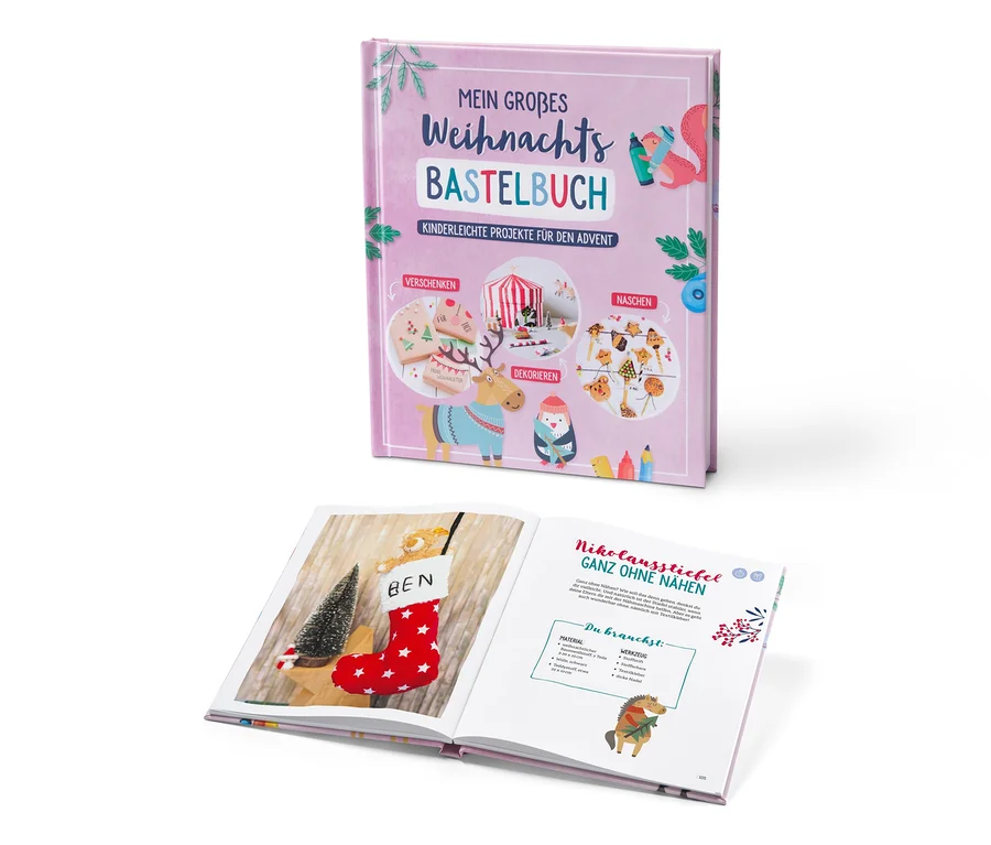 Zwei geöffnete Ausgaben des Buches Mein großes Weihnachtsbastelbuch. Auf dem Einband sind weihnachtliche Motive abgebildet.