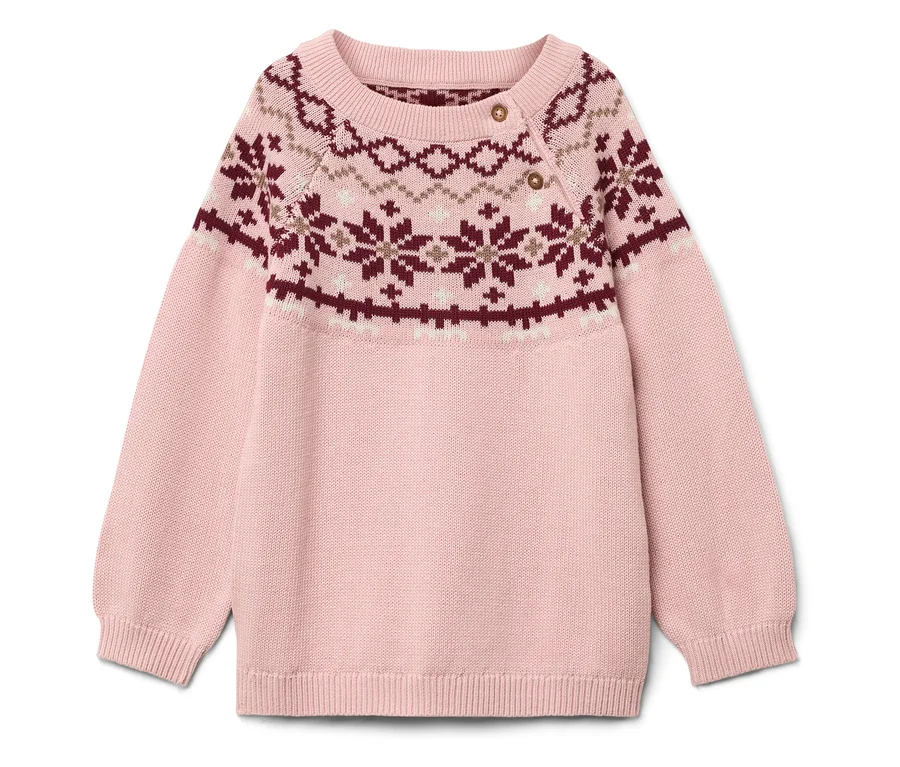 Rosa Pullover mit Weihnachtsmuster.