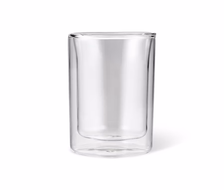 Leeres doppelwandiges Caffè Crema Glas.