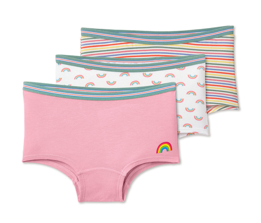 Drei Pantys: Eine rosafarbene mit Regenbogen, eine weiße mit Regenbogen und eine gestreifte.