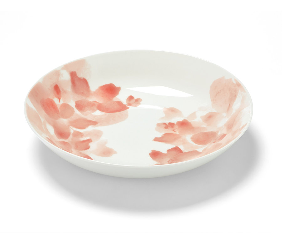 Weiße Porzellan-Schale mit Blumenmuster.