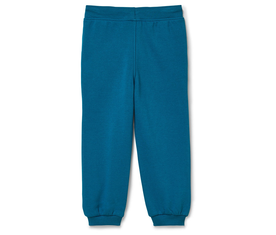 Blaue Trainingshose auf weißem Hintergrund.