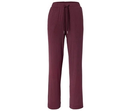 Eine weinrote Hose mit Kordelzug und Zickzackmuster ist vor einem weißen Hintergrund zu sehen.