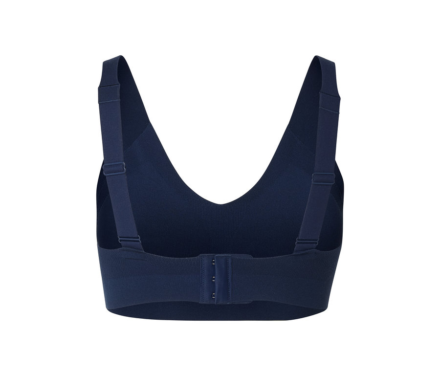 Detailansicht eines blauen Sport-BHs mit verstellbaren Trägern und Hakenverschluss.