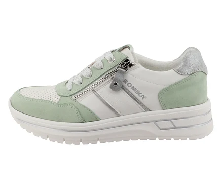 Ein einzelner Romika Sneaker in Weiß und Mintgrün steht auf einer weißen Oberfläche.