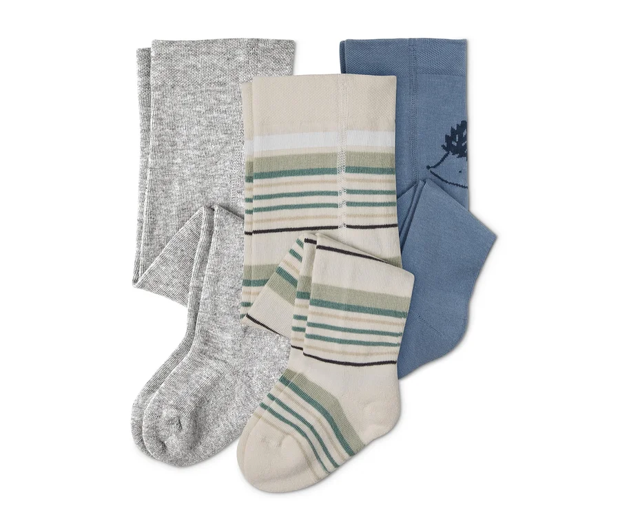 Drei Strumpfhosen: grau, beige gestreift und blau mit Blattdruck.