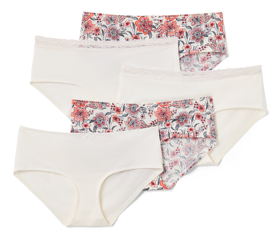 Nahaufnahme von fünf cremefarbenen Pantys, einige davon mit Blumenmuster.