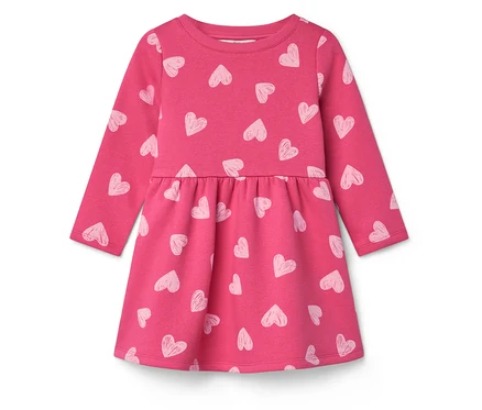 Rosa Kleid mit langen Ärmeln und weißen Herzchen-Muster.