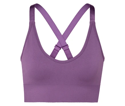 Detailaufnahme eines lila Sport-BHs mit gekreuzten Trägern.