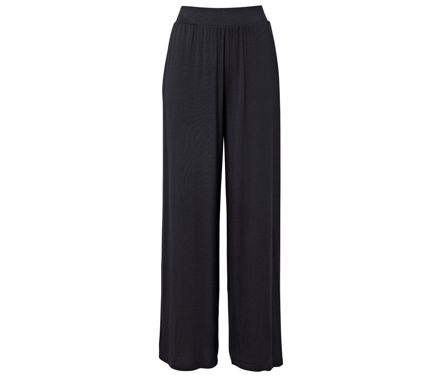 Schwarze, locker sitzende Hose mit elastischem Bund.