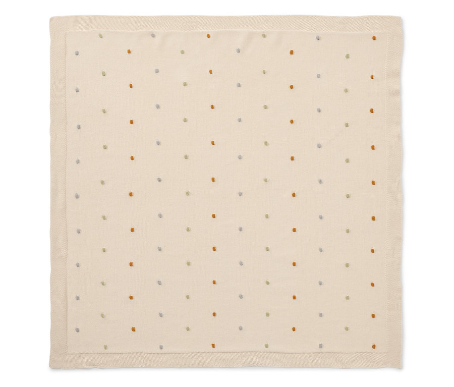 Cremefarbene Babydecke mit kleinen bunten Punkten.