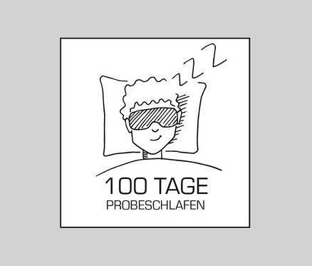 Eine Person liegt mit einer Schlafmaske auf einem Kissen, darüber steht ZZZ.