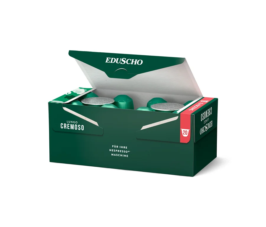 Geöffnete, dunkelgrüne Verpackung mit Eduscho Lungo Cremoso Kaffeekapseln.