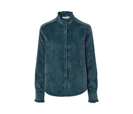 Eine blaue Cordbluse mit Rüschendetail.