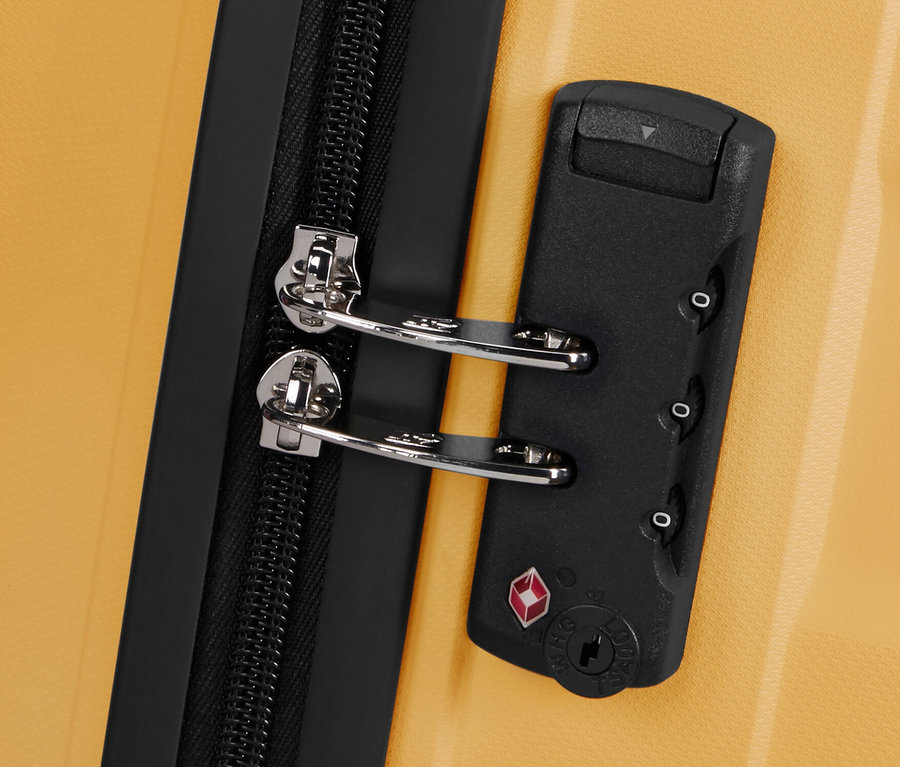 Detailaufnahme eines gelben American Tourister »Jetdriver 3.0« Koffers mit schwarzem Reißverschluss und Zahlenschloss.