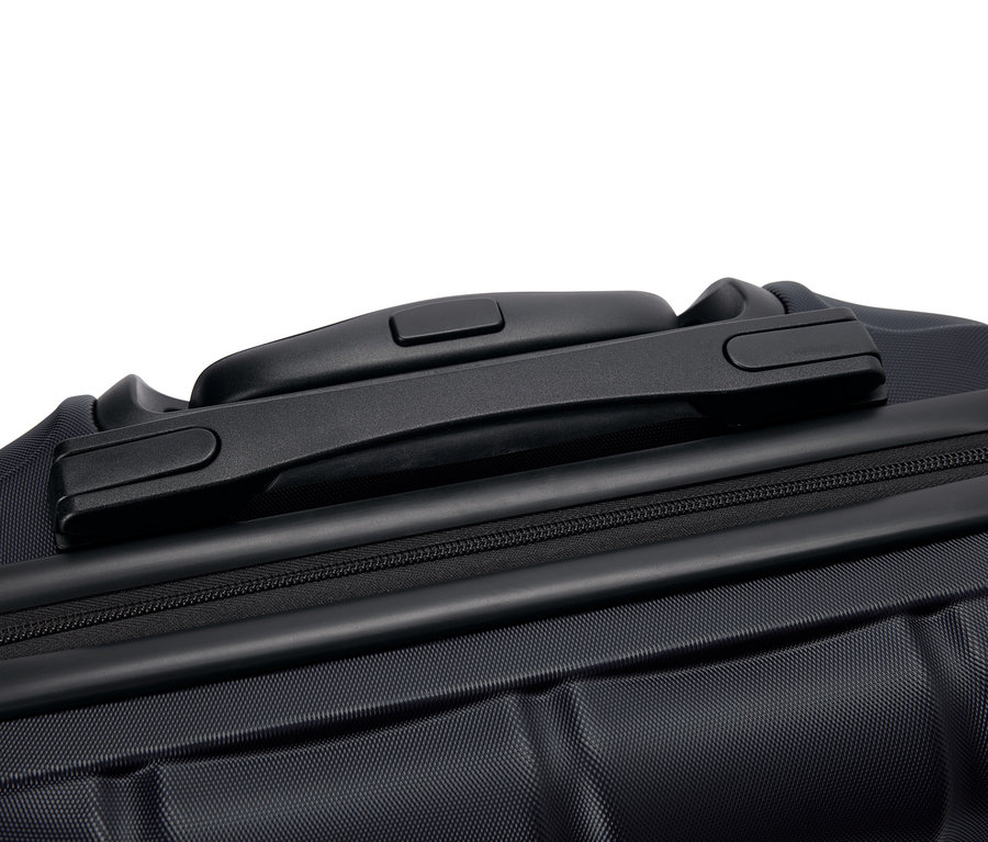 Detailaufnahme eines schwarzen Koffers mit Griff und Reißverschluss.