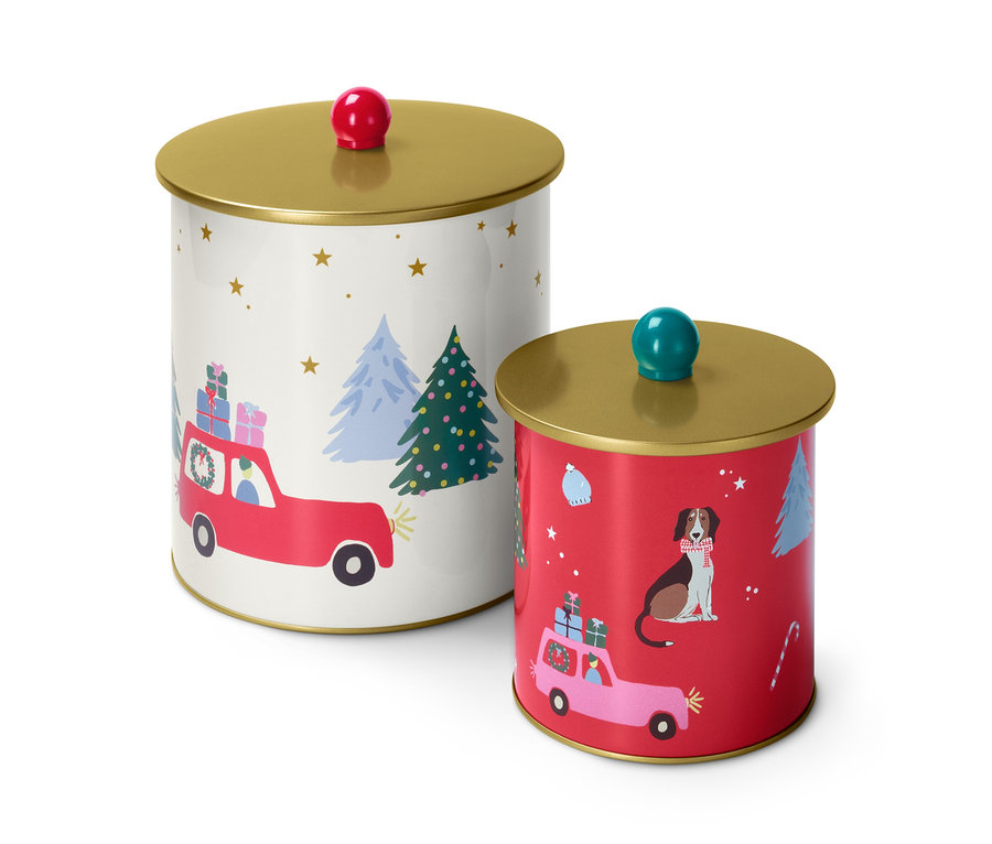Zwei Keksdosen mit Weihnachtsmotiven.