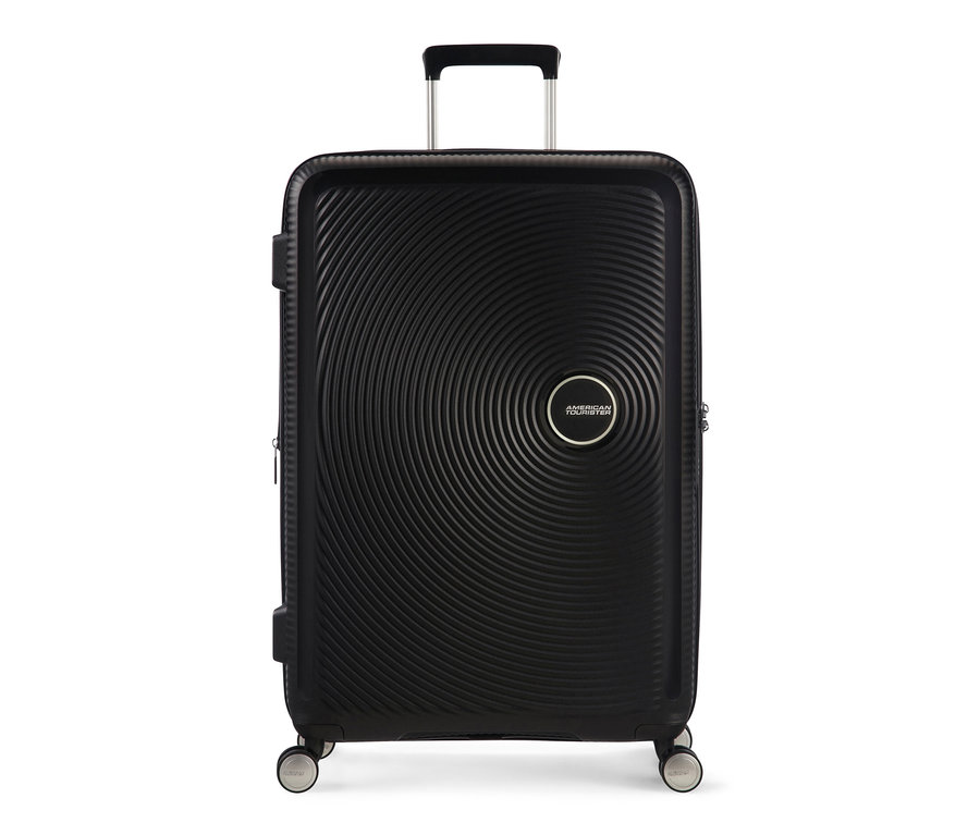 Ein mittelgroßer, schwarzer American Tourister Hartschalenkoffer »Soundbox« Spinner.