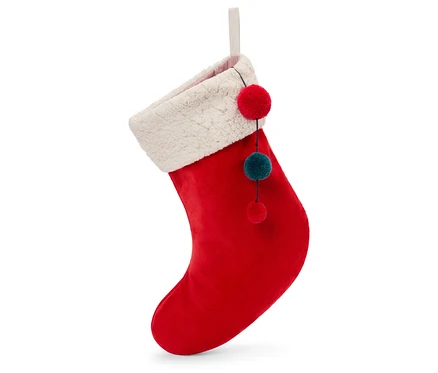 Ein roter Weihnachtsstiefel mit weißem Rand und Zierbommeln hängt vor einem weißen Hintergrund.