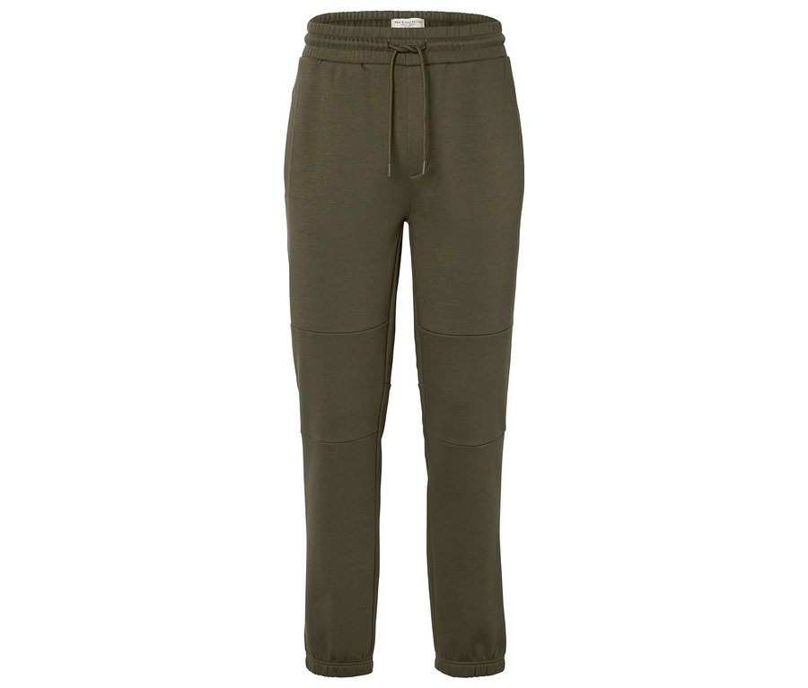 Grüne Jogginghose mit Kordelzug in der Taille.