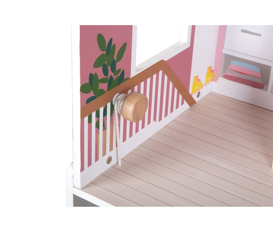 Detailaufnahme vom Innenraum des small foot Puppenhaus Stadtvilla mit Holzmöbeln und Dekorationen.