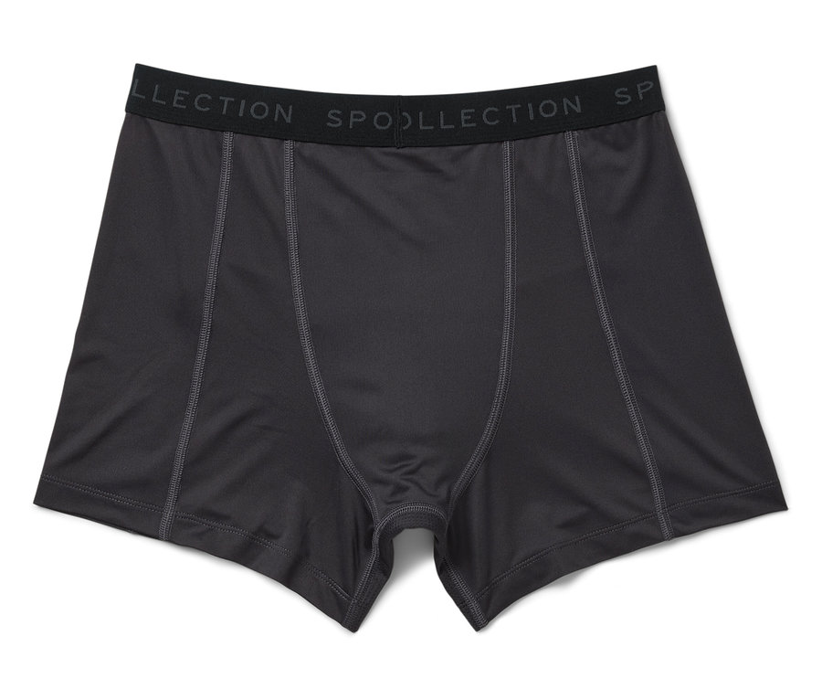 Schwarze Herren-Boxershorts mit Spoo Collection Schriftzug am Bund.