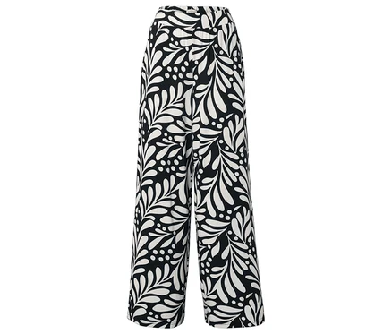 Schwarze Hose mit weißen Blatt- und Punktmustern.