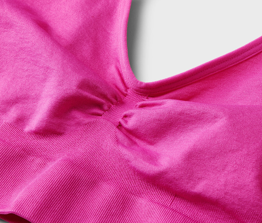 Nahaufnahme eines pinkfarbenen Sport-BHs.