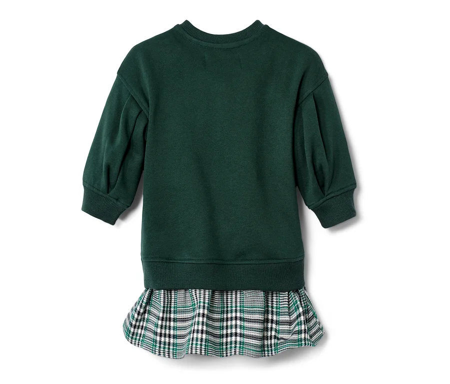 Grünes Kleid mit kariertem Rock von hinten.