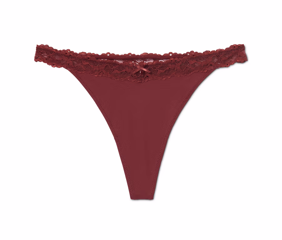 Einzelner Burgunderroter String mit Spitze.