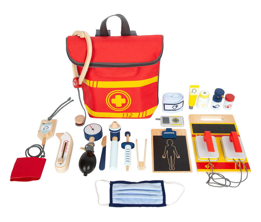 Roter small foot Notarzt-Rucksack mit medizinischem Spielzeug wie Stethoskop, Verband und Maske.