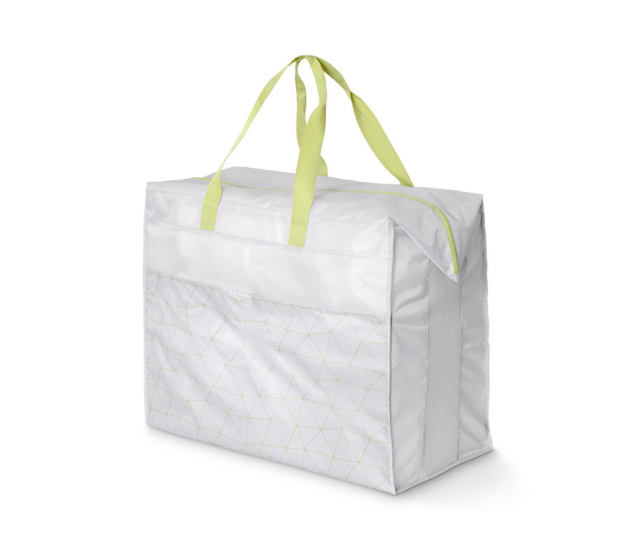 Weiße Jumbo-Bettwarentasche mit grünen Griffen und geometrischem Muster.