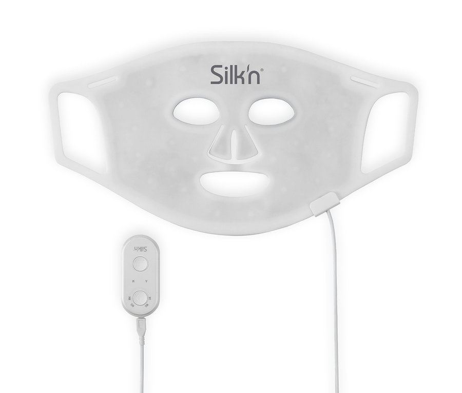 Weiße Silk'n LED-Gesichtsmaske 100 mit Kabel und Steuerung.