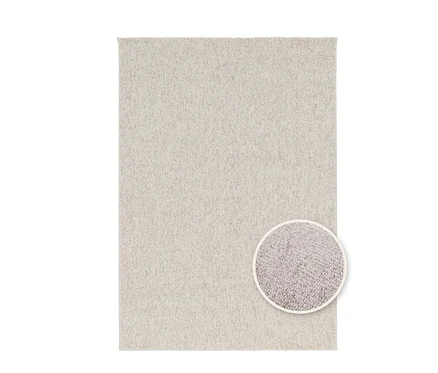 Ein creme-anthrazitfarbener Teppich "Daisy" mit einer Detailaufnahme der Textur.