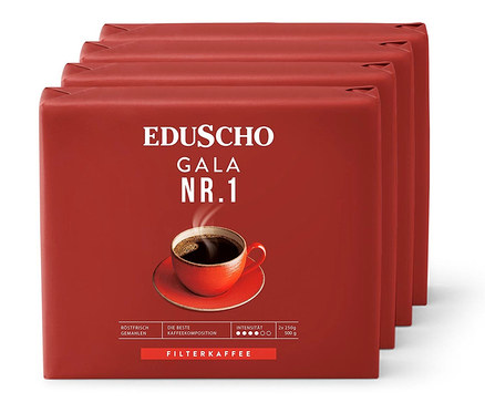 Vier Packungen Eduscho Gala Nr. 1 gemahlener Kaffee, jede in roter Verpackung mit einer Tasse Kaffee darauf.